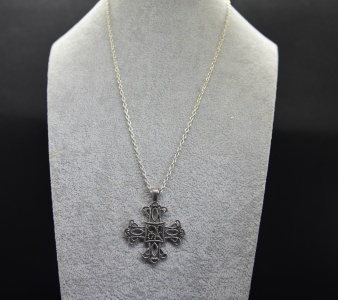 base metal chain and silver tone Gothic cross